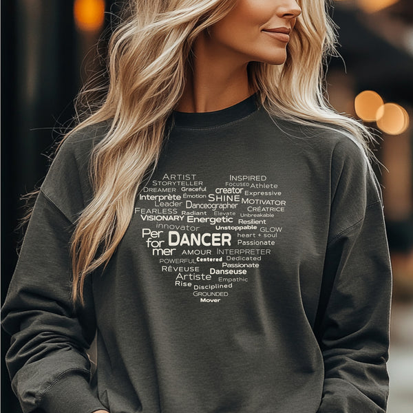 Model wearing pepper-colored long sleeve Dance Heart tee with white word-art design on the front
