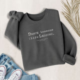 Dance Lessons are Life Lessons sweatshirt in gray – flat lay style from MusicWorks